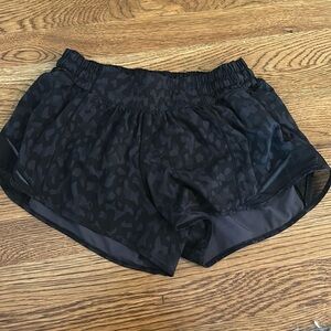 Lululemon size 6 Black Leopard print Hotty Hot shorts